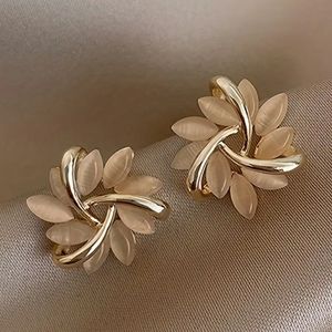 Flower cat eye stone stud earrings.